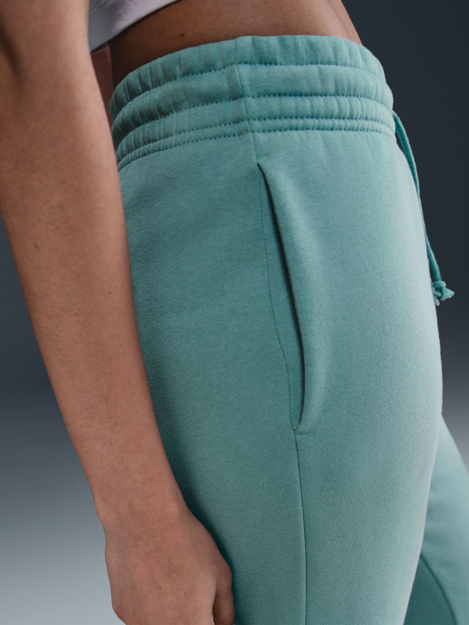 Брюки женские Nike W NSW PHNX FLC MR PANT STD бирюзовые FZ7626-017 изображение 6