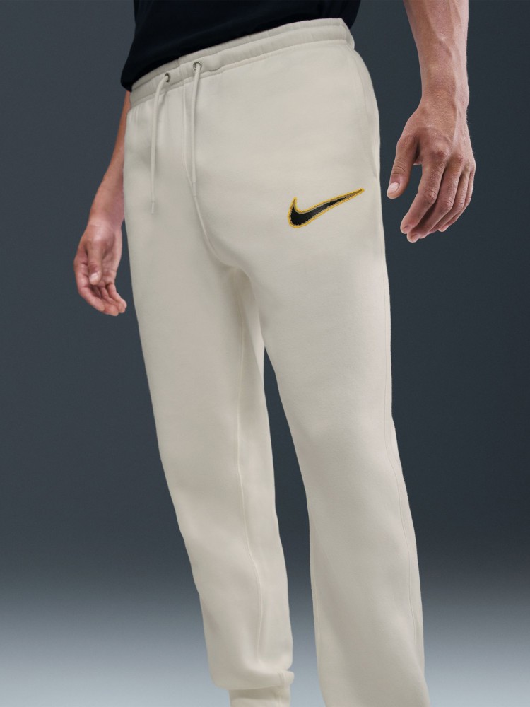 Брюки мужские Nike M NK CLUB BB JGGR NEO VARSITY молочные HV0865-133 изображение 5