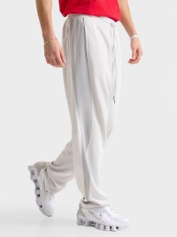Брюки мужские Nike M NIKE AIR PK TRACK PANT белые HJ0283-009 изображение 3